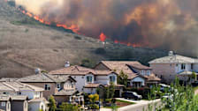 Southern California brush fire near houses