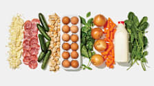 From left: Cotija Cheese, Salami, cucumbers, grilled chicken chunks, eggs, basil, onions, baby carrots, milk, Spinach