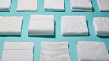 Various folded bath towels.