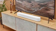 Sonos Beam (Gen 2) soundbar in a home environment on a television media unit.