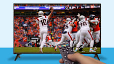 Football game on TV with remote control
