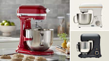 red KitchenAid Bowl Lift KSM70 stand mixer on counter with baking sheet of cookies and Pioneer Woman PW3509956914017 and Beautiful by Drew Barrymore 19113 stand mixers on beige backgrounds