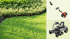 A top down view of a green lawn bordered by a curved garden edge, Echo SRM-2620 string trimmer, and the Ego ZT4205S riding mower.