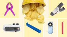 Six different chip clips and an open bag of chips