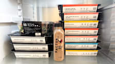 Stack of Factor meals in fridge