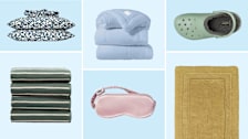Brooklinen striped towels and luxe core bedsheets, Buffy duvet, Slip sleep mask, Frontgate bath mat, lined Croc