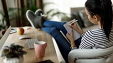 Person making a list at home