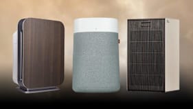From left: Alen BreatheSmart 75i Pure, Blue Pure 211i Max, and Coway Airmega ProX Air Purifiers on a smoke background