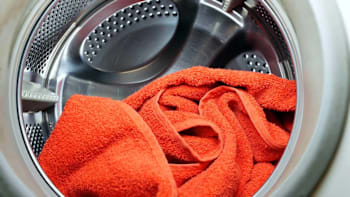 orange towel inside a washer