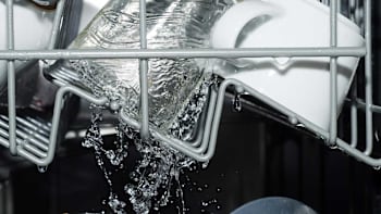 close up of dishwasher with water