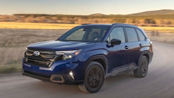 2025 Subaru Forester driving on a dirt road