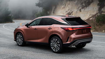 2026 Lexus RX in copper on mountain road with fog