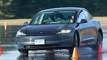 Tesla Model 3 going through the wet handling course