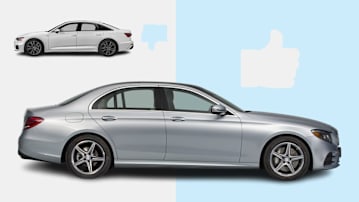 2019 Audi A6 next to graphic thumbs down icon and 2017 Mercedes-Benz E-Class next to graphic thumbs up icon