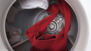 clothes tumbling in a dryer