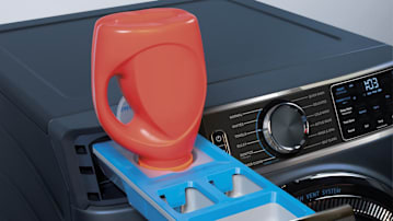 laundry detergent being dispensed into a GE washing machine