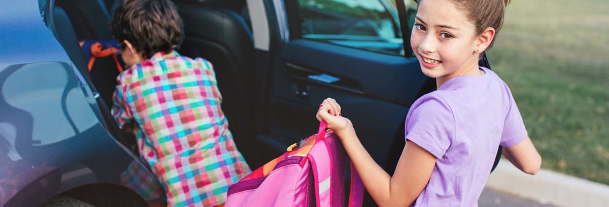 Kids getting into car