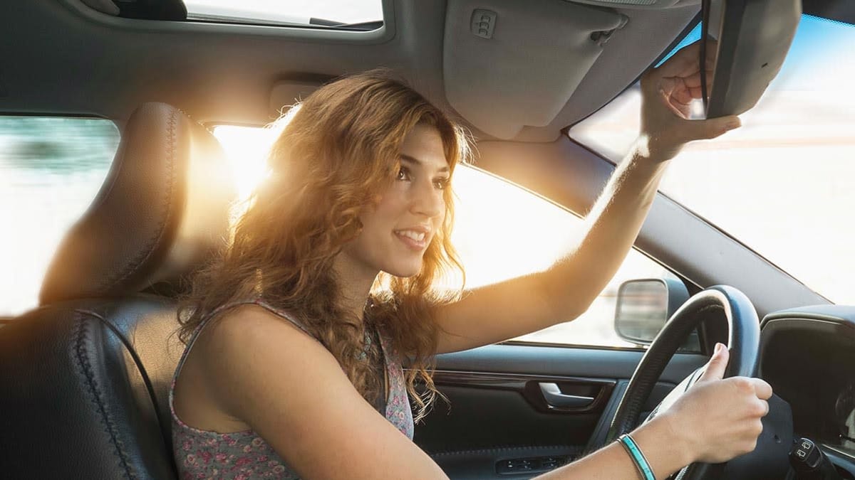 Young person in car