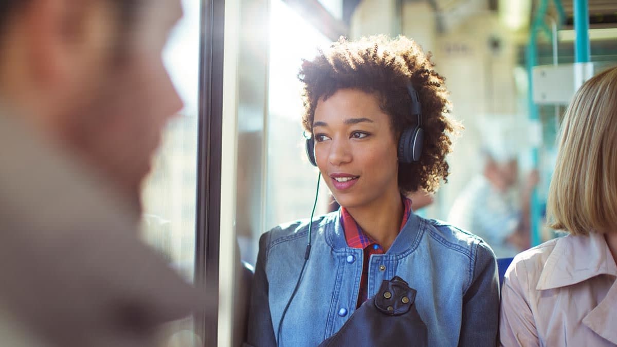 Woman listening to headphones