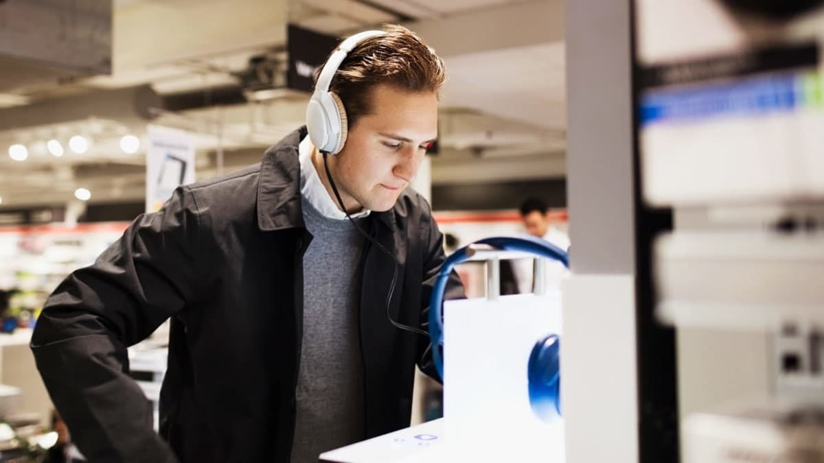 Man shopping for headphones
