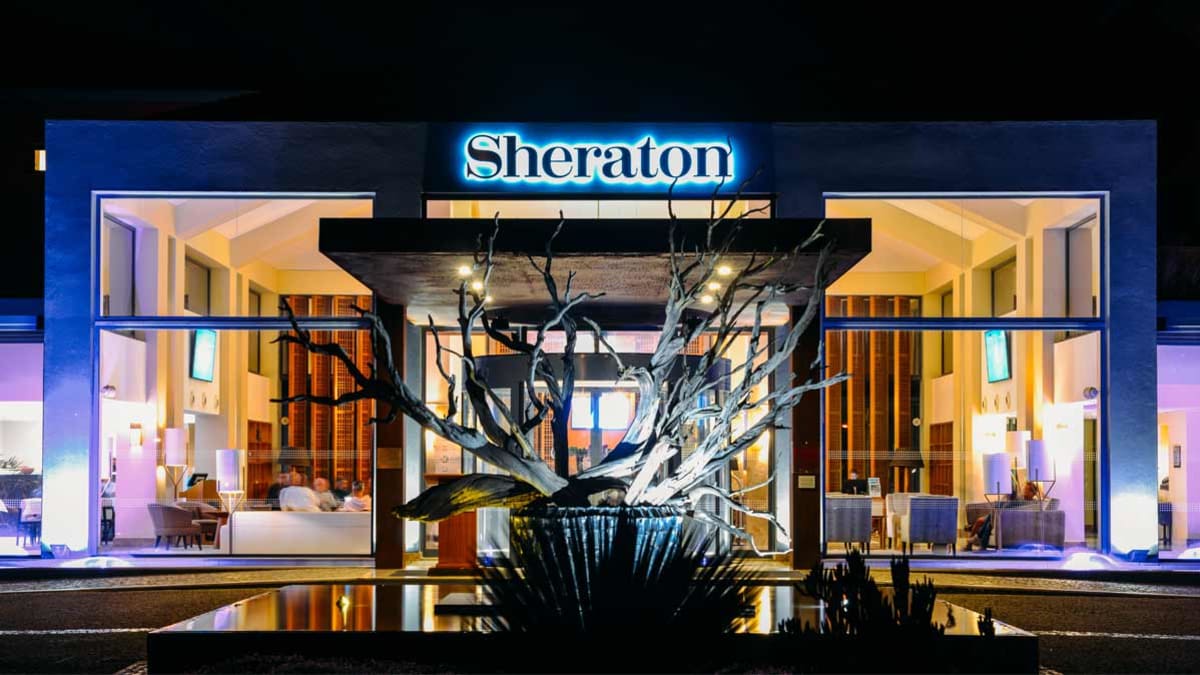 Cascais, Portugal - Oct 27, 2018: Main entrance of luxurious Sheraton hotel illuminated at night in Cascais, Portugal