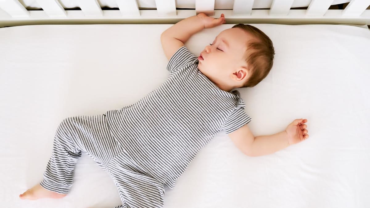 baby sleeping in crib