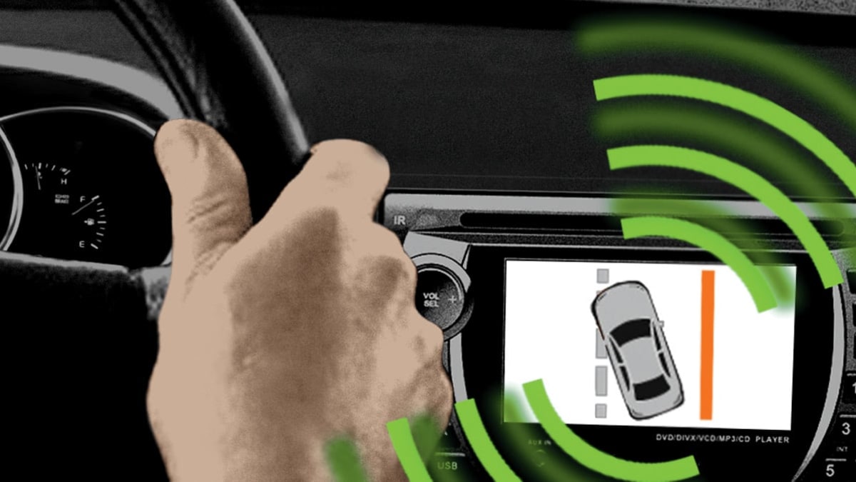 Illustration of hands on steering wheel and lane assist warning on screen