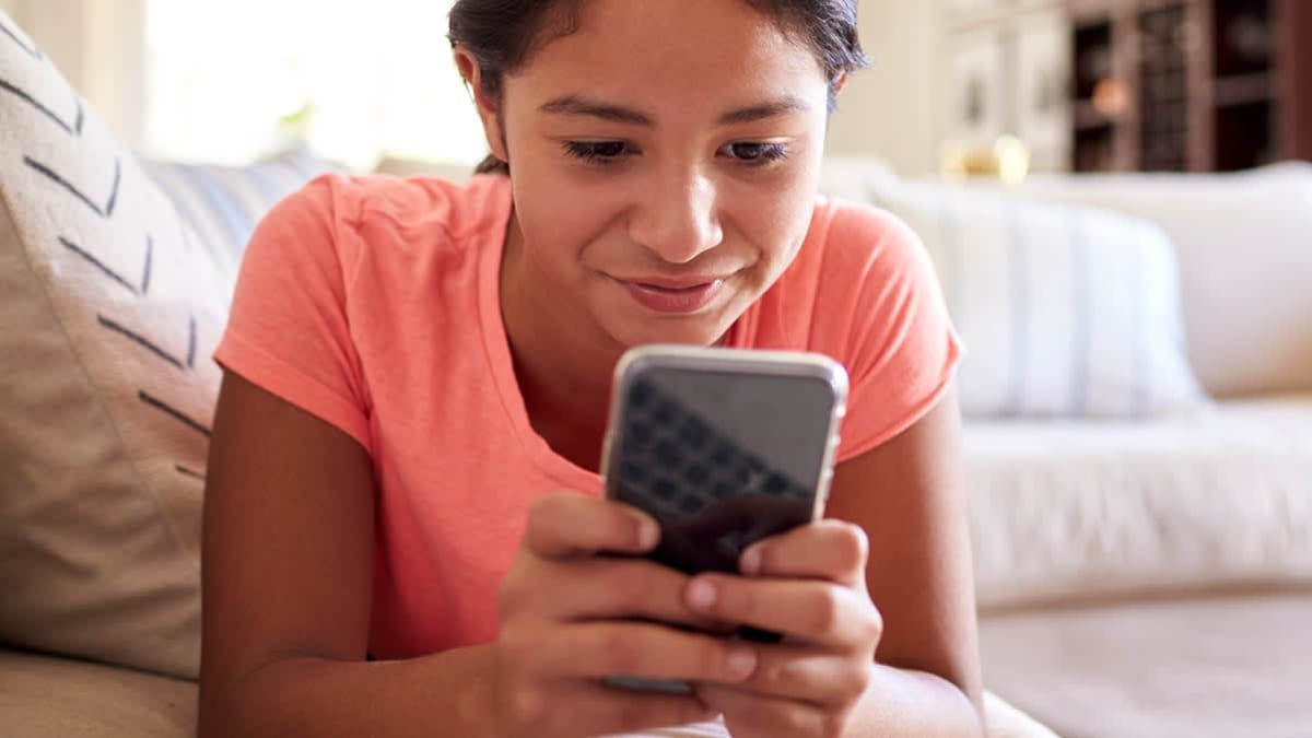 Kid using cell phone