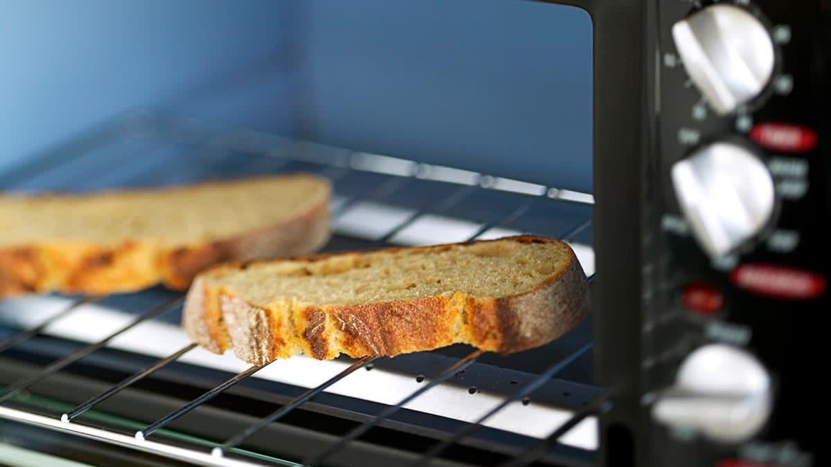 close up of two pieces of toast in toaster oven