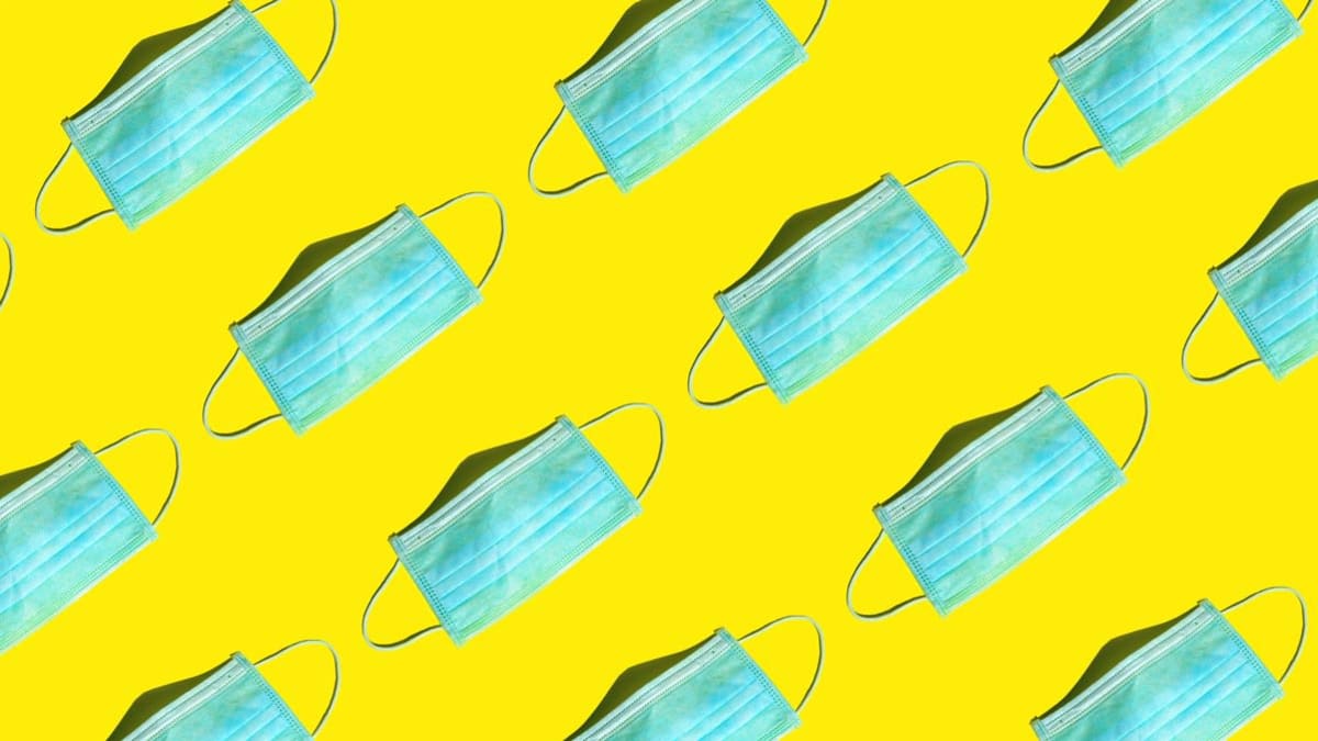 masks on yellow background
