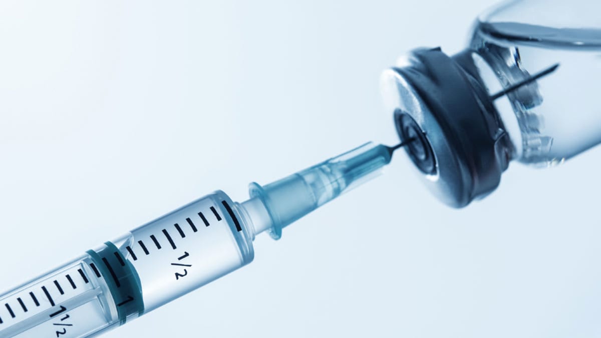 vaccine bottle syringe