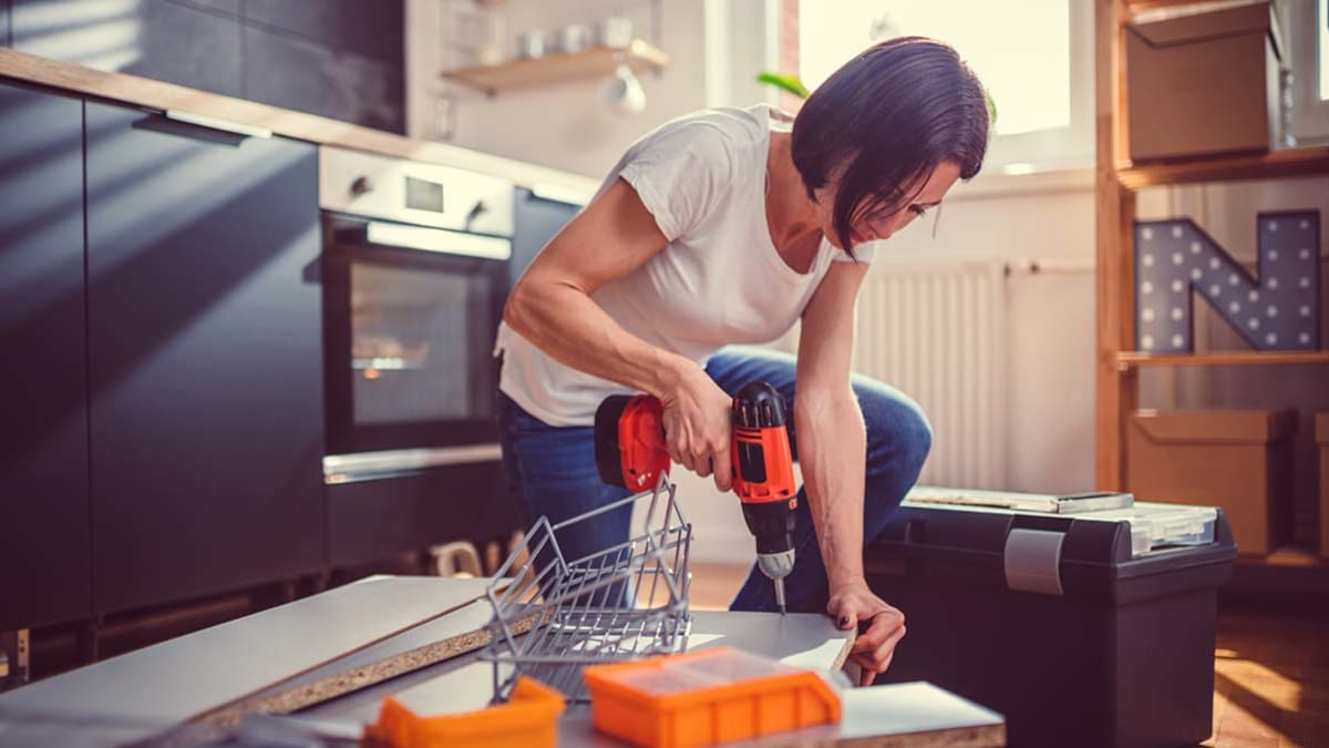 person using drill