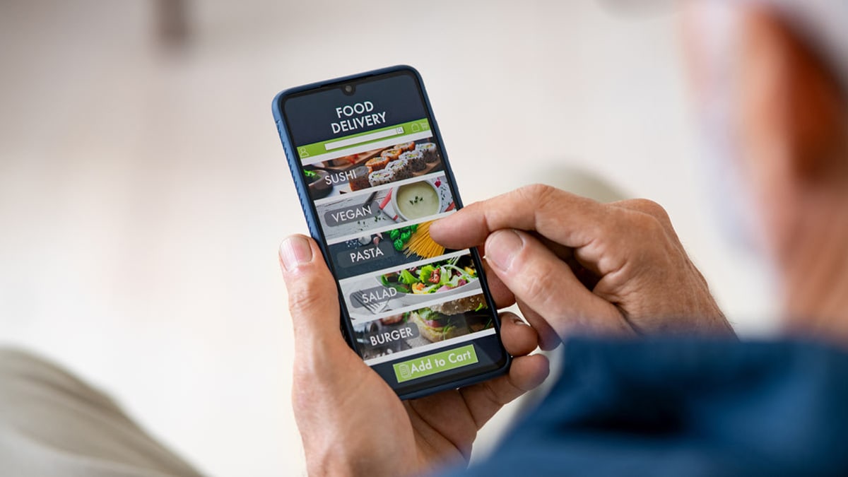 person using food delivery app