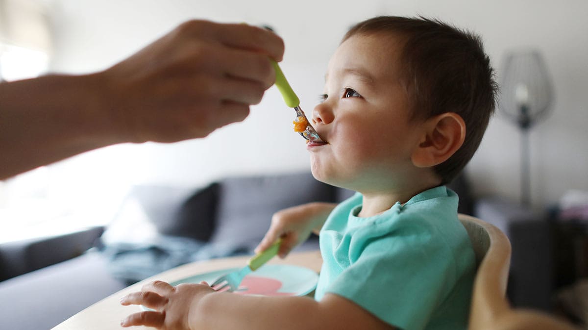 baby eating baby food