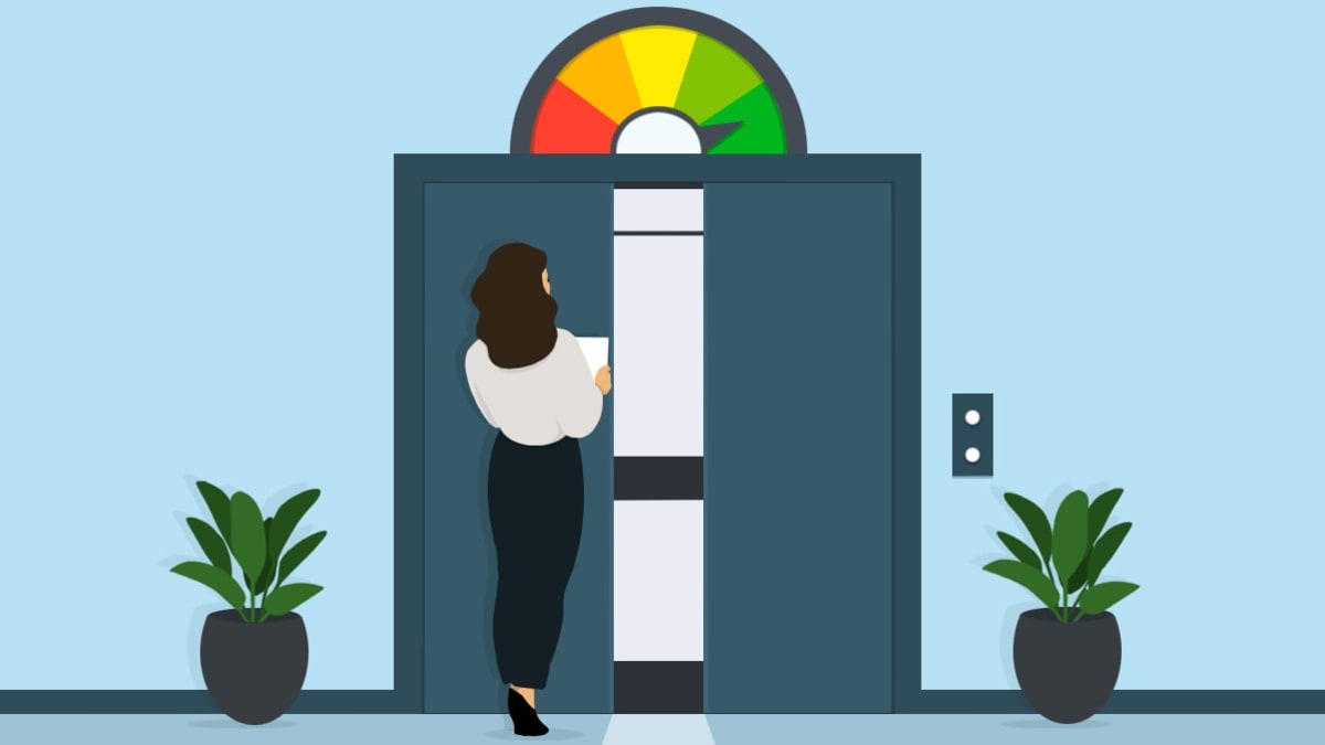 A person walking with paper in hand towards an open elevator door with credit gauge level above it