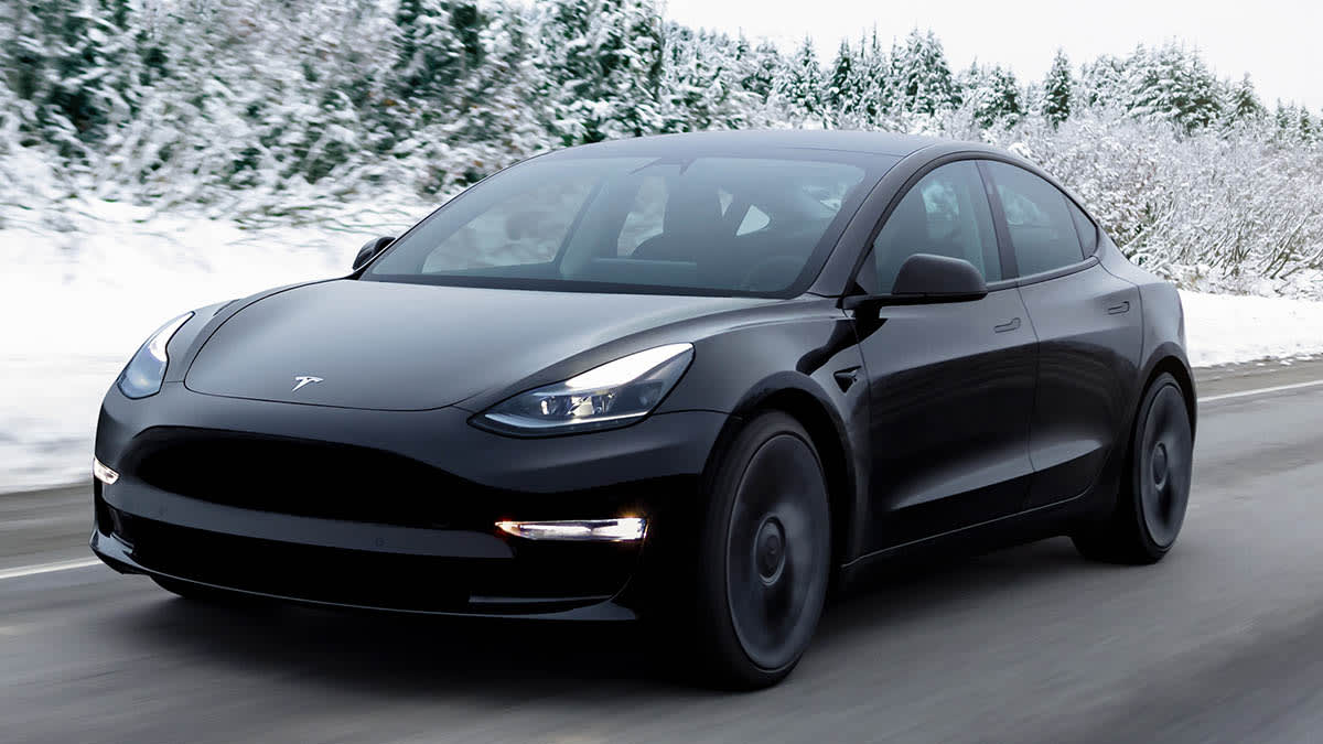 Tesla Model 3 driving in the snow