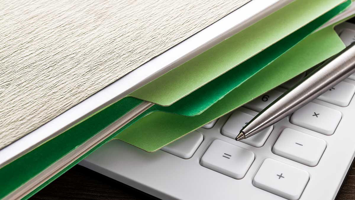 Folders, a pen and keypad