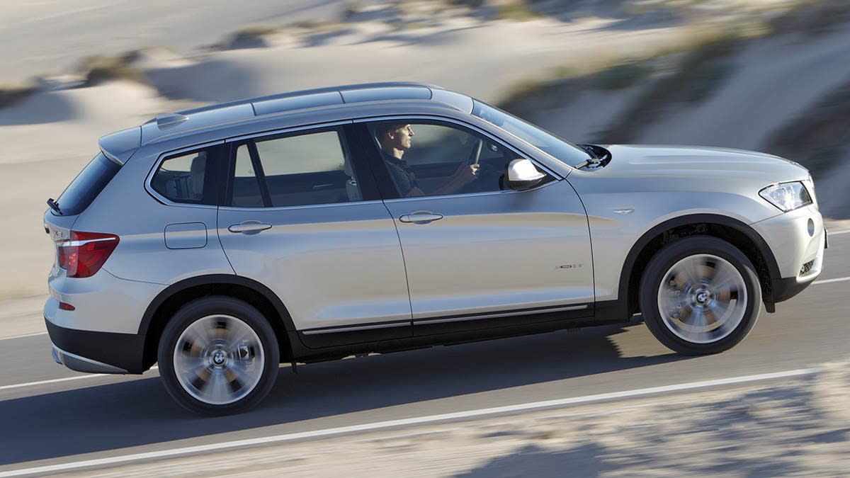 2007 BMW X3 driving near beach