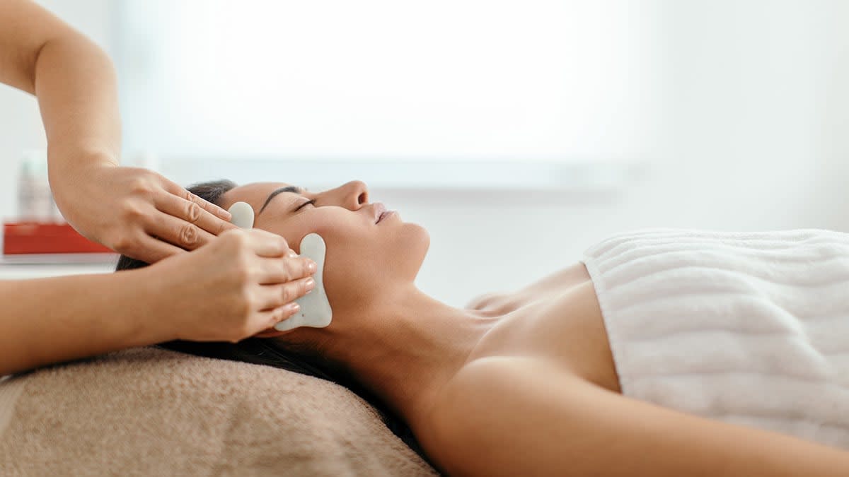 woman getting a facial massage