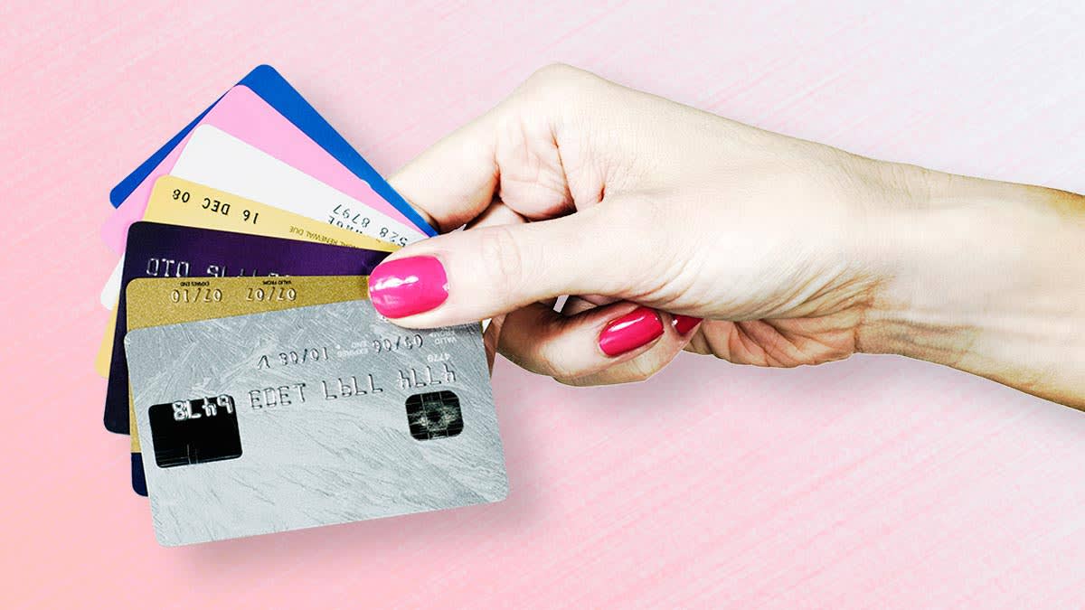 Hand holding credit cards