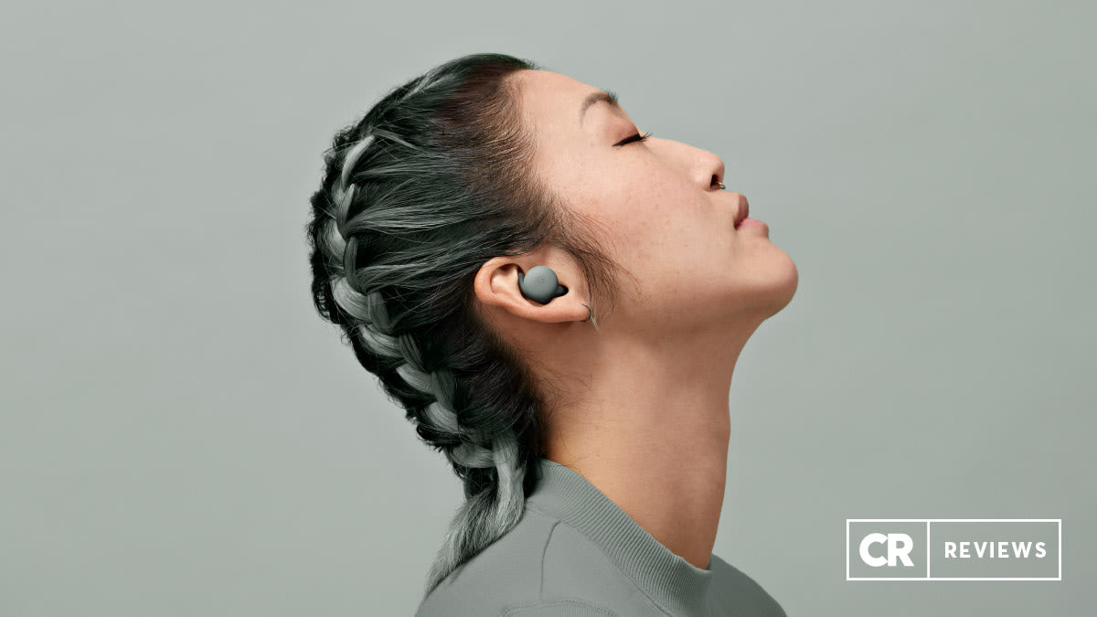 side view of person wearing Google Pixel Buds A Series Headphones on grey background