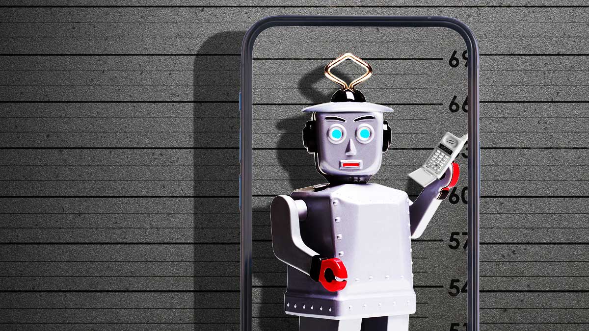 A toy robot holding a cell phone in front of a police lineup