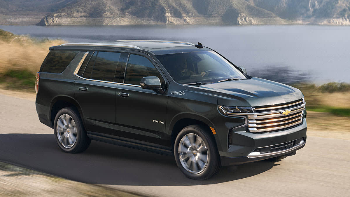 2022 Chevrolet Tahoe driving along a lake