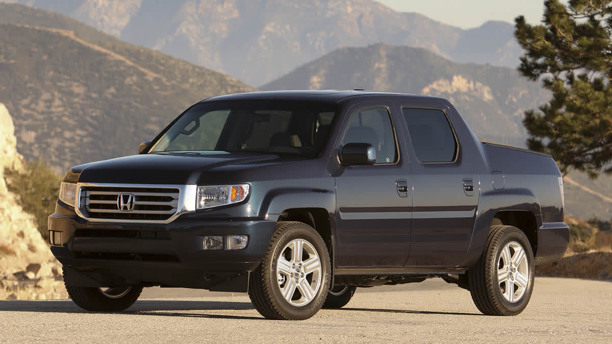 2012 Honda Ridgeline RTL parked near desert mountains