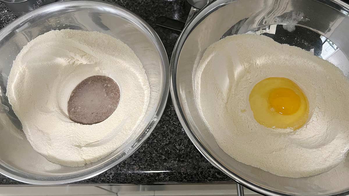 Two mixing bowls, 1 with flax "egg" and the other with a regular egg.