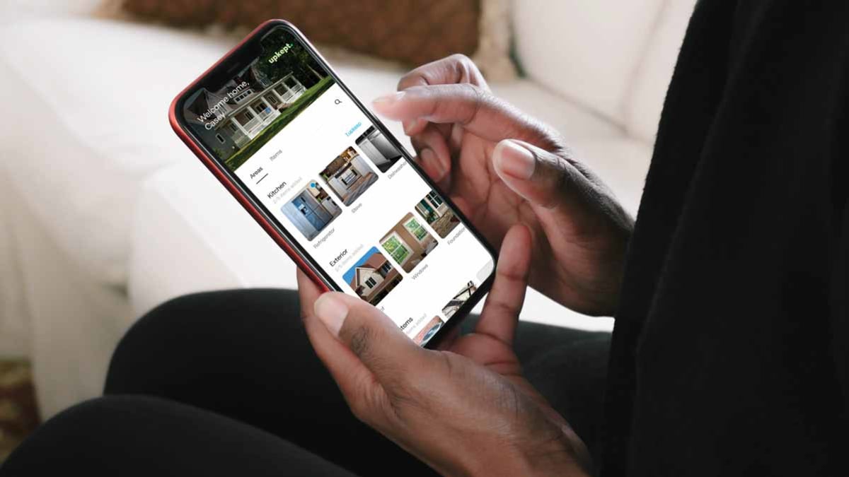 person using the Upkept app on on a smartphone