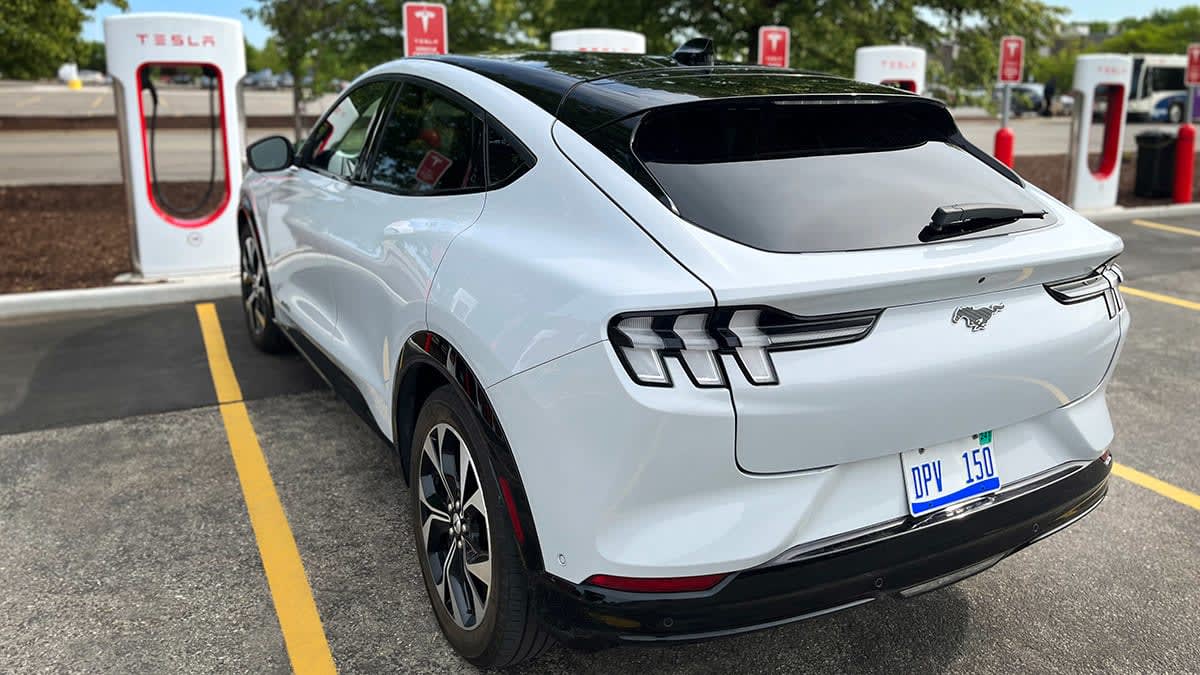 Ford Mustang Mach-E at a Tesla Supercharger