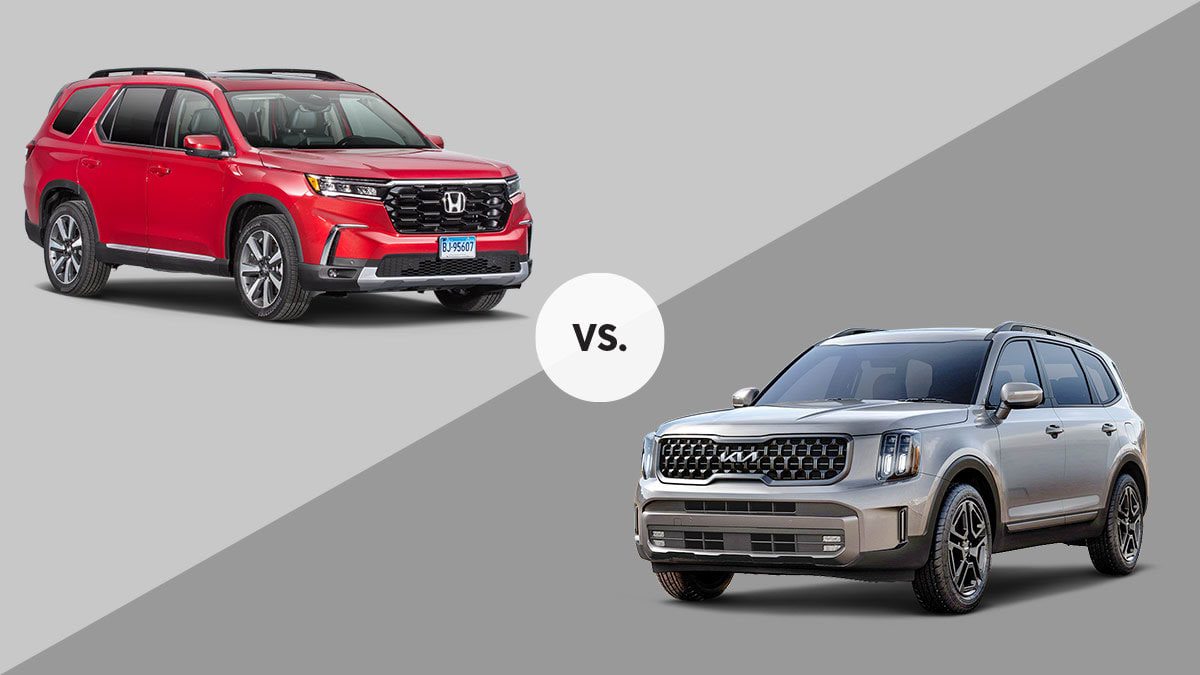 red 2023 Honda Pilot and grey Kia Telluride