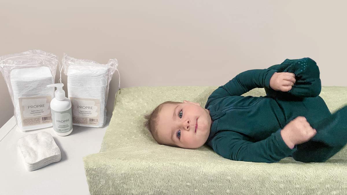 Baby on the changing table with Propre French Diaper Cream System