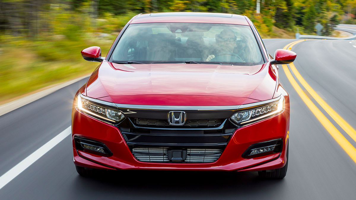 2018-2019 Honda Accord Sport 2.0T driving down a curvy road